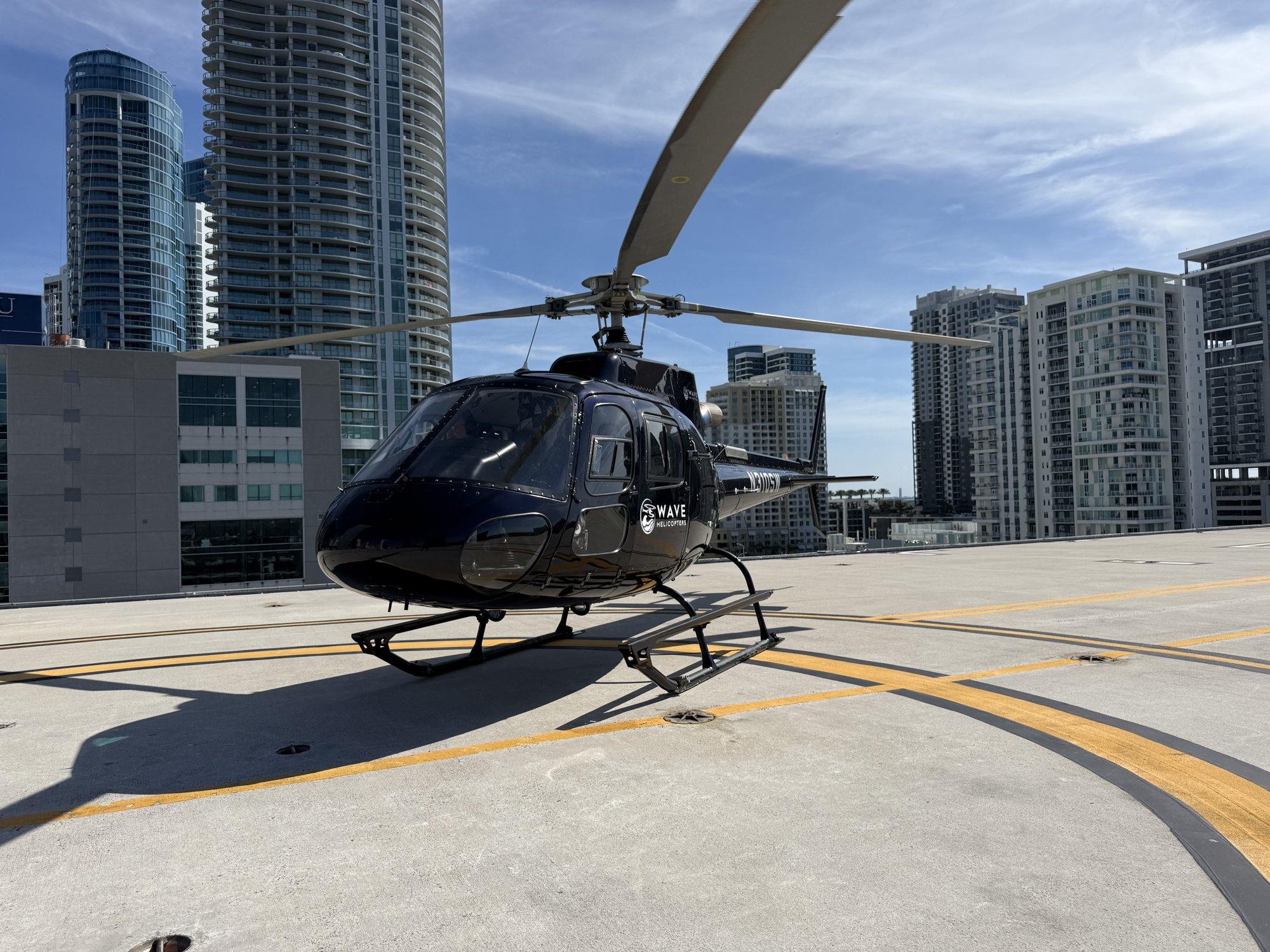 Wave Helicopters AStar at a downtown helipad